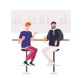 Pair of happy friends sitting on stools at bar counter and drinking beer or alcoholic beverages. Two cute funny smiling