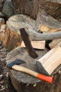 Pair of Hatchets on a Log Royalty Free Stock Photo