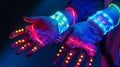 A pair of hightech fingerless gloves adorned with neoncolored lights and sensors allowing for precise control and