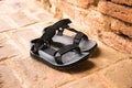 A pair of hiking sandals on old brick floor. Travel Lifestyle adventure active summer vacations outdoor concept Royalty Free Stock Photo