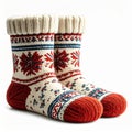 Pair of Holiday Knitted Socks with Intricate Designs in Studio Shot Royalty Free Stock Photo