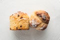 Pair of homemade carrot muffins with empty space on white fabric background. Copyspace top view