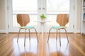 pair of iconic bentwood chairs on parquet flooring