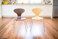 pair of iconic bentwood chairs on parquet flooring
