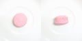 Pair image top view and side view of isolated pink mini macaron on white dish Royalty Free Stock Photo