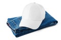 Pair of Jeans and Baseball Cap on White Background