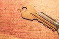 Pair of keys isolated on a wooden background. safety and security concept