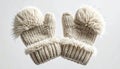 Pair of Knitted Cream Mittens with Fur Cuff on White Background Royalty Free Stock Photo