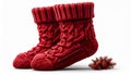 Pair of Knitted Red Wool Socks on a White Background Royalty Free Stock Photo