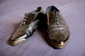 Pair of ladies black leaher wingtip shoes