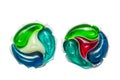 Pair of laundry detergent pods on transparent background