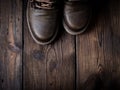 Pair of leather brown shoes on a wooden background Royalty Free Stock Photo