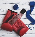 Pair of leather red boxing gloves, blue bandage Royalty Free Stock Photo