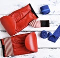 Pair of leather red boxing gloves, blue bandage Royalty Free Stock Photo