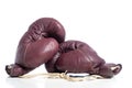 A pair of leather vintage boxing gloves on white background