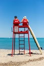 Lifeguards observing beach from tower