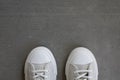 Pair of light color keds on the concrete floor Royalty Free Stock Photo