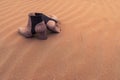 Pair of lost women shoes on the sand in the dunes Royalty Free Stock Photo