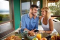 Pair in love having breakfast on terrace Royalty Free Stock Photo