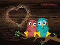 A pair of lovely owls in love, sit on a branch. Colorful confett