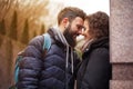 A pair of loving people hugging on the street. The concept of relationship and love