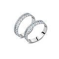 A pair of luxury white gold rings with diamonds isolated Royalty Free Stock Photo