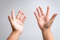 Pair of male hands raising up and reaching out gesture Royalty Free Stock Photo