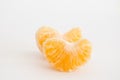 Pair of mandarin orange segments on white background Royalty Free Stock Photo