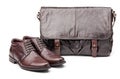 Pair of men boots and messenger bag over white Royalty Free Stock Photo