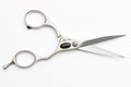 Pair of metal hair cutting scissors on white background, top view Royalty Free Stock Photo