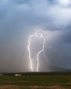 A Pair of Mirror Lightning Bolts in the Foothills Royalty Free Stock Photo