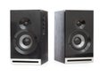 Pair of modern black wooden sound speakers, acoustic system isolated on a white background Royalty Free Stock Photo