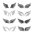 Pair of monochrome wings vector icon set Royalty Free Stock Photo