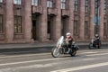 A pair of motorcyclists in motion