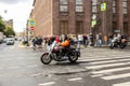 A pair of motorcyclists at speed in motion