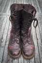 Pair of muddy Dr Marten boots