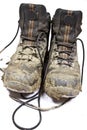 Pair muddy walking boots Royalty Free Stock Photo
