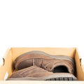 Pair of a new brown leather walking shoes in the box, isolated on white background Royalty Free Stock Photo