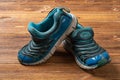a pair of old blue sporty shoes for kid Royalty Free Stock Photo