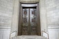 A pair of old brass doors in an entry Royalty Free Stock Photo