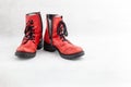 Pair of old leather red discarded boots with laces Royalty Free Stock Photo