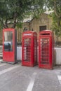 A pair of old red telephone booths in the historic center of Valletta, Malta Royalty Free Stock Photo