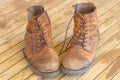 Pair of old worn brown leather hiking boots Royalty Free Stock Photo