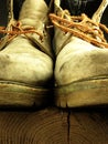 Pair of old, worn heavy boots. Royalty Free Stock Photo