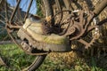 Pair of old worn leather hiking boots on a bicycle Royalty Free Stock Photo