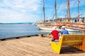 Pair of older people sitting on bench, Oslo Norway Royalty Free Stock Photo