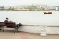 Pair of older persons on a bench