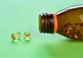 Pair of Omega 3 vitamins pills from the bottle Royalty Free Stock Photo