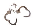 A pair of opened handcuffs with keys Royalty Free Stock Photo