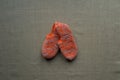 A pair of orange knitted slippers